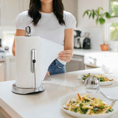 tension arm paper towel holder - brushed finish - lifestyle woman taking sheet on kitchen counter